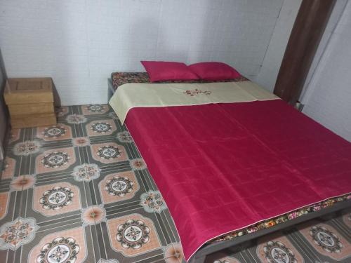 Katil atau katil-katil dalam bilik di Homestay Hoàng Vũ