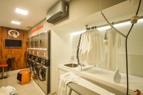 Ett badrum på SP Stays Itaim FL Residence