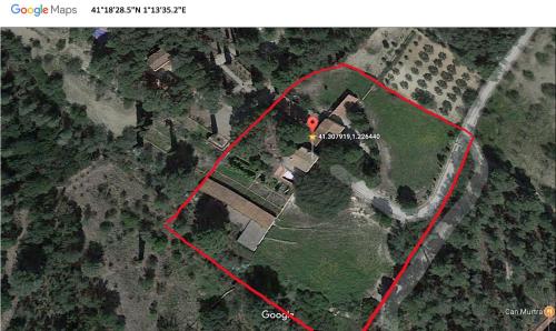 a map of a house with a red line at Masia Rural Les Alsines in Valls