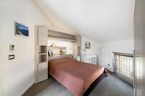 Ένα ή περισσότερα κρεβάτια σε δωμάτιο στο Colonno Penthouse
