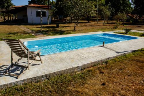 Πισίνα στο ή κοντά στο Fazendinha Rústica com Piscina Próxima a Curvelo