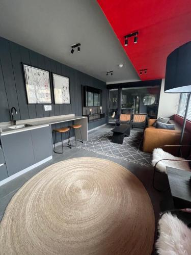 a large living room with a red ceiling at PuertoVaras410 in Puerto Varas