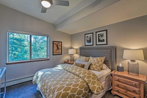 a bedroom with a bed and a window at Modern Frisco Condo with Deck Walk to Main St! in Frisco