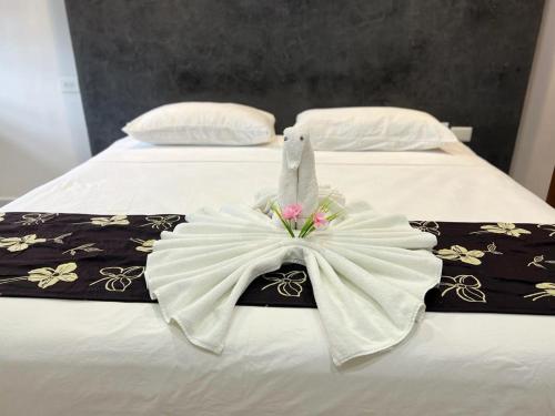 Postel nebo postele na pokoji v ubytování Hotel Ko'ox Wenne