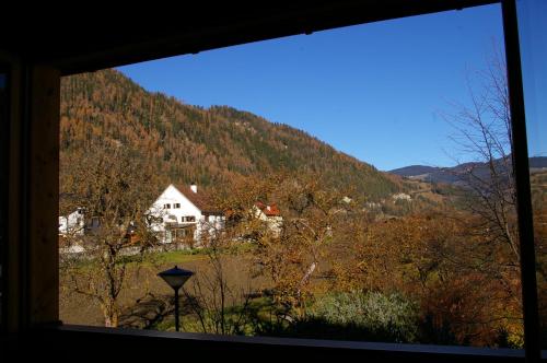 a view from a window of a house in a mountain at StarkApart - XL-Wohnung-geräumig-stilvoll in Ried im Oberinntal