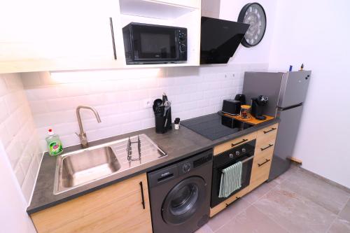 Η κουζίνα ή μικρή κουζίνα στο La Cosy House