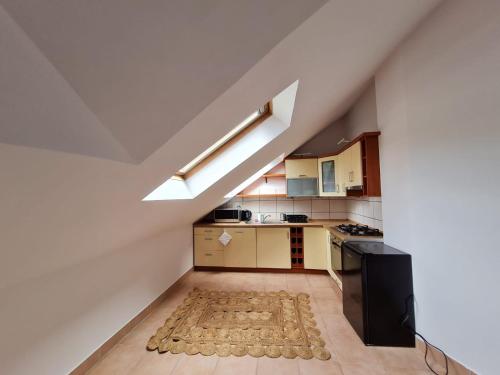 Kuchyňa alebo kuchynka v ubytovaní U Stóp Czantorii Apartament