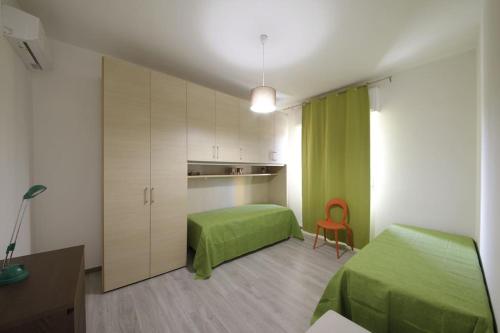 Postel nebo postele na pokoji v ubytování La casa sulla Latomia con parcheggio gratuito privato