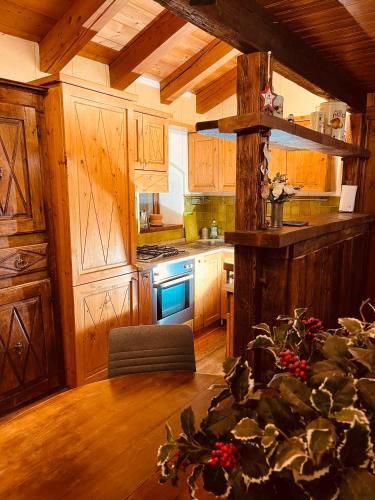 Кухня или мини-кухня в Chalet Blanc "Coeur Sapin"
