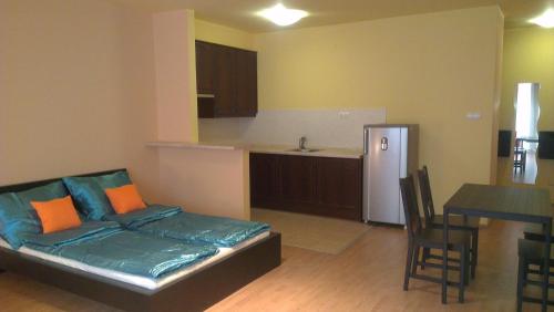 Postel nebo postele na pokoji v ubytování Apartman 4 you Wellness