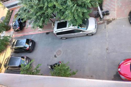 an overhead view of cars parked in a parking lot at Vault of istanbul in Istanbul
