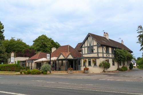 a house on the side of a street at The Inn South Stainley in Harrogate