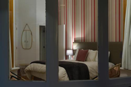 Postel nebo postele na pokoji v ubytování Esplanade Apartments