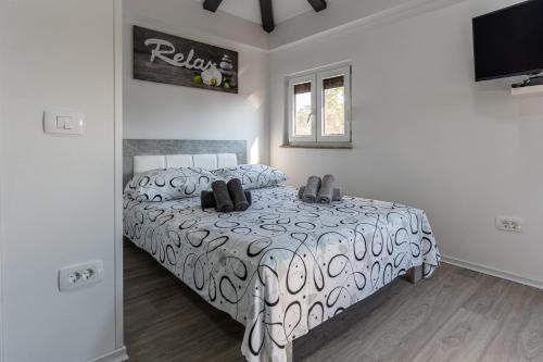 Postel nebo postele na pokoji v ubytování Apartments Marancin
