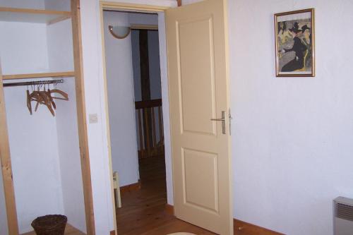 an open door in a room with a hallway at Domaine de Salomony in Marcols-les-Eaux