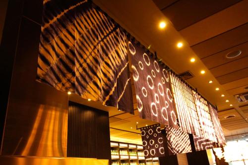 a stage in a building with a curtain at Mercure Belo Horizonte Lourdes in Belo Horizonte