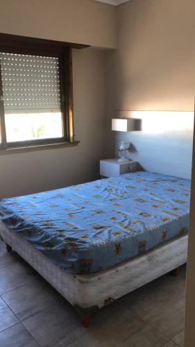 Ένα ή περισσότερα κρεβάτια σε δωμάτιο στο Lo de Yanel