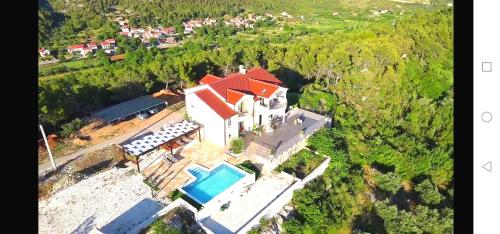 Kolam renang di atau dekat dengan Villa Scolopax rusticola Skradin with heated pool