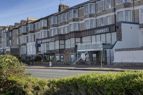 a building on the side of a street at Best Western Lancaster Morecambe Lothersdale Hotel in Morecambe