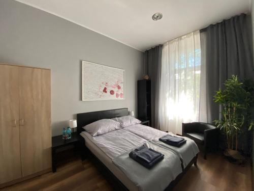 Кровать или кровати в номере Hostel Rynek22
