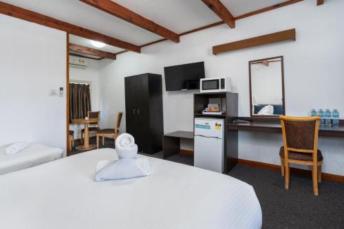 Η κουζίνα ή μικρή κουζίνα στο Apollo Motel Biloela