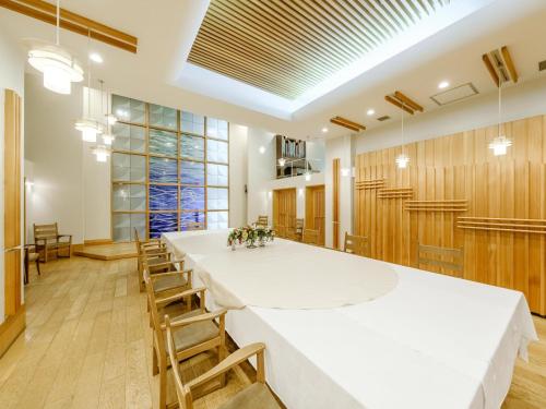 Tabist Abashiri Central Hotelにあるビジネスエリアまたは会議室