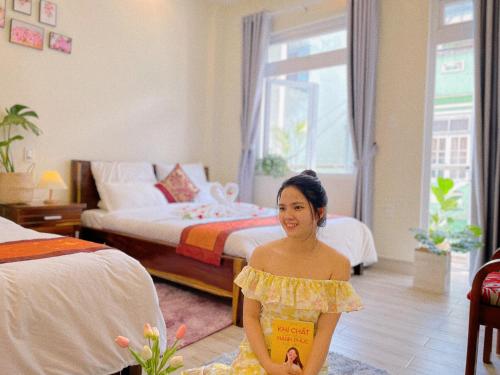 Postel nebo postele na pokoji v ubytování Moc Nhien Hostel Da Lat