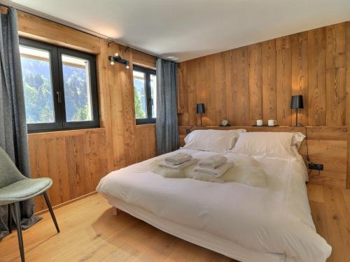 Postel nebo postele na pokoji v ubytování Chalet Morzine, 5 pièces, 8 personnes - FR-1-627-66