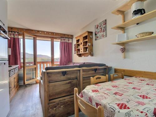 Studio cabine pour 4 au pied des pistes avec balcon