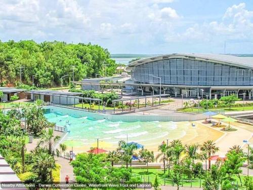 an artist rendering of the planned water park at the resort at ZEN CITY Modern 1-BR City Apt Near Mindal Markets in Larrakeyah