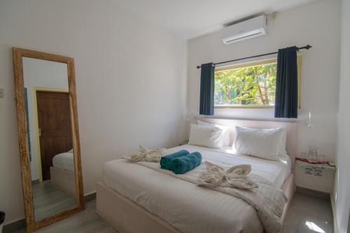 Cama o camas de una habitación en Dragon Dive Komodo Dive Resort