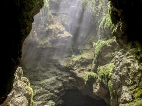 a view of a cave with a rock formation at Apartman Šoljac in Perušić