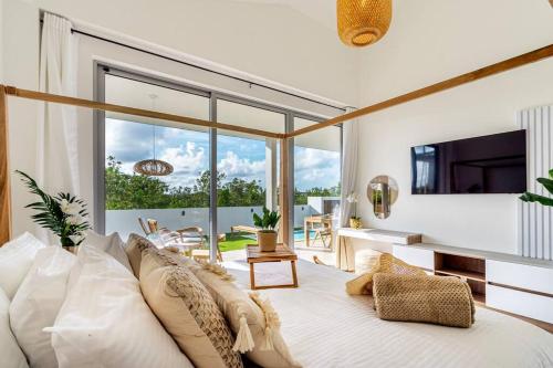  3 bdrm 2 bath Villa with Private Pool- Azure Beach Residences -  Room  picture :   Tea/Coffee maker    Shower    TV                           