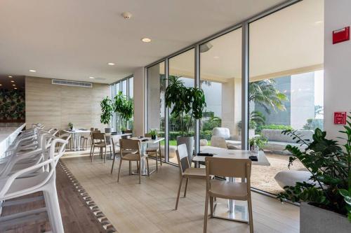  3 bdrm 2 bath Villa with Private Pool- Azure Beach Residences -  Room  picture :   Tea/Coffee maker    Shower    TV                           