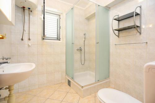 Koupelna v ubytování Apartments by the sea Marina, Trogir - 9037