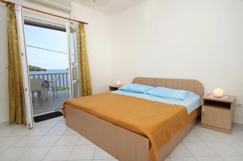 Katil atau katil-katil dalam bilik di Apartments by the sea Molunat, Dubrovnik - 8956