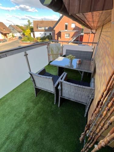 Balkoni atau teres di Ferien-Whg Stünkel nahe Steinhuder Meer mit Garten und Balkon