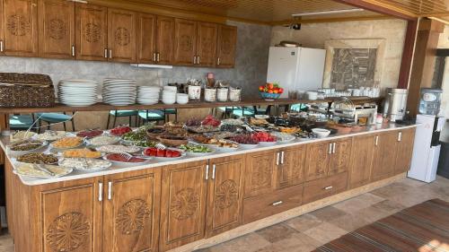 a kitchen with a buffet of food on a counter at Balloon View Hotel in Goreme