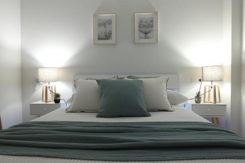 Postelja oz. postelje v sobi nastanitve Apartamento Mar de Ardora