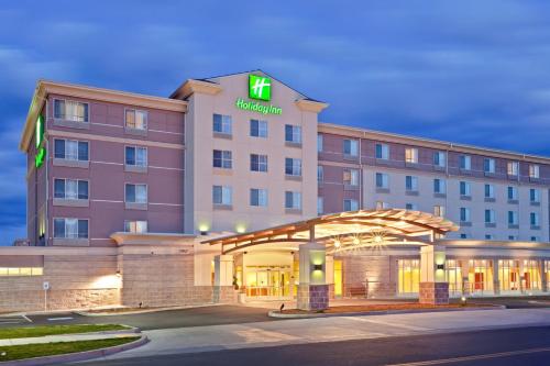 a rendering of a hotel with a sign on it at Holiday Inn Yakima by IHG in Yakima