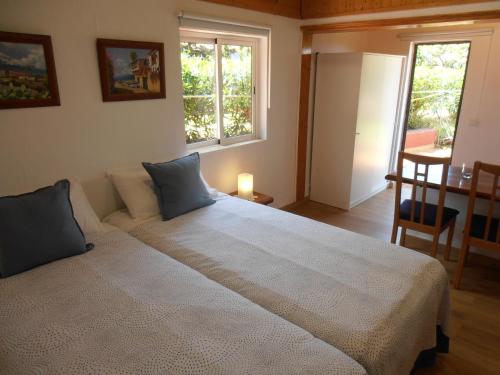 מיטה או מיטות בחדר ב-Casa Isabel