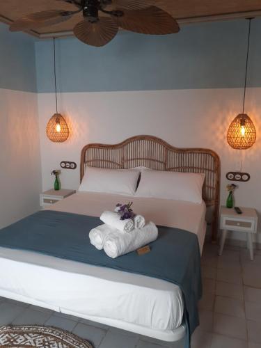 Кровать или кровати в номере Joanna Hotel