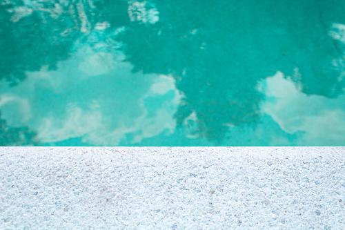 a reflection of the sky in a pool of water at Villa Caterina in La Maddalena