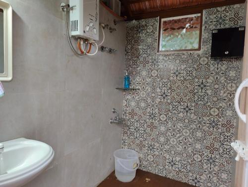 Koupelna v ubytování Suvarna Farm Stay
