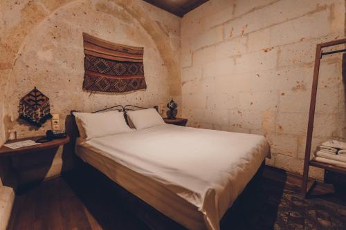 Кровать или кровати в номере La maison de Şişik