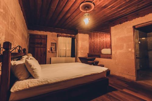 Кровать или кровати в номере La maison de Şişik