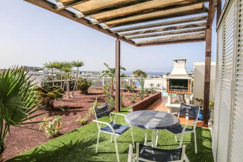 Relax and Sea Views Las Coloradas - Private Pool with BBQ By Lanzarote Vacation Homes