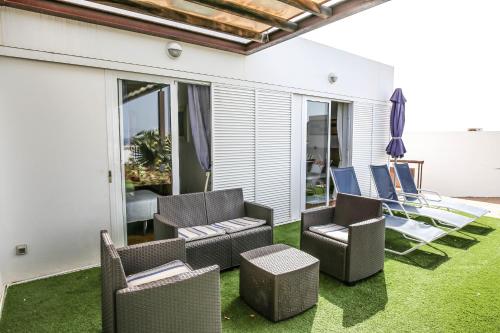 Relax and Sea Views Las Coloradas - Private Pool with BBQ By Lanzarote Vacation Homes