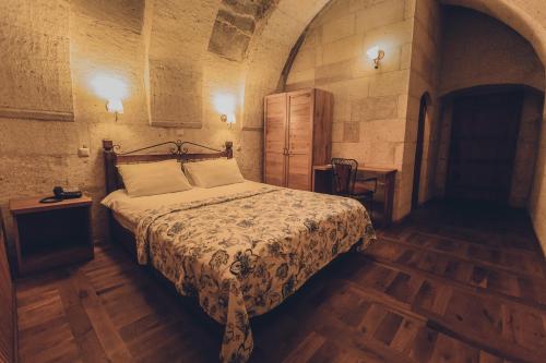 Кровать или кровати в номере La maison de Şişik