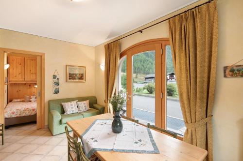 A bed or beds in a room at Terra Chalet Martina